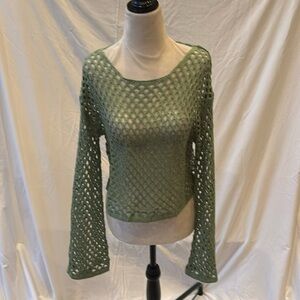 Super cute cropped bell sleeve sweater. Meant to be worn with a Cami underneath.